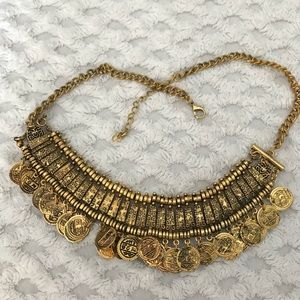 Goldtone coin necklace. Approximately 16”